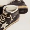 Sky-Star in pelle nappa nera con stella in pelle bianca