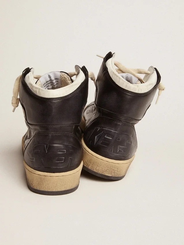 Sky-Star in pelle nappa nera con stella in pelle bianca
