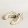 Slide con stella in pelle metallizzata argento e inserto in pelle con stelle