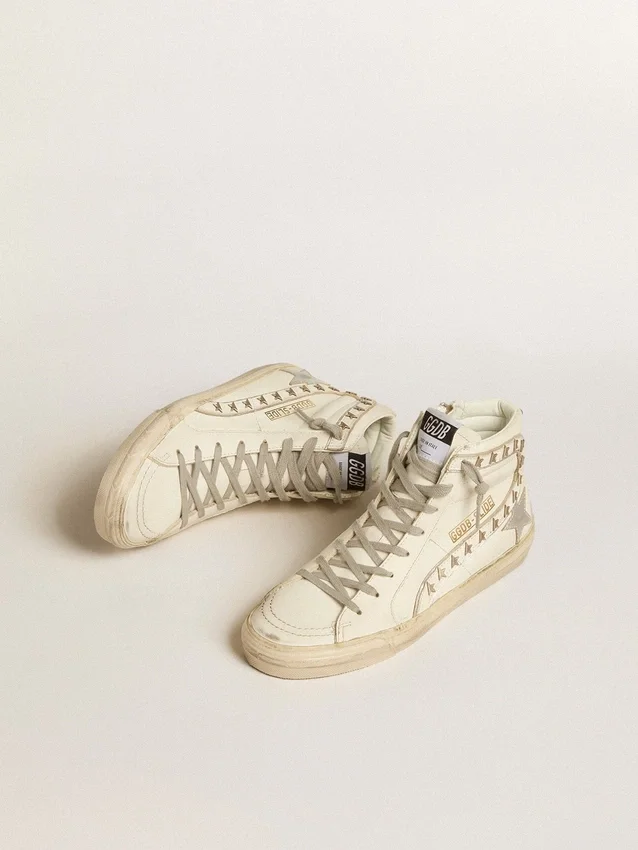 Slide con stella in pelle metallizzata argento e inserto in pelle con stelle