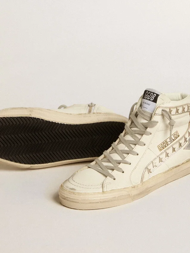 Slide con stella in pelle metallizzata argento e inserto in pelle con stelle