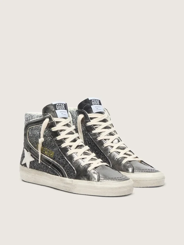 Slide da donna in nero e glitter argento con stella in pelle e riflessi metallici