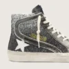 Slide da donna in nero e glitter argento con stella in pelle e riflessi metallici