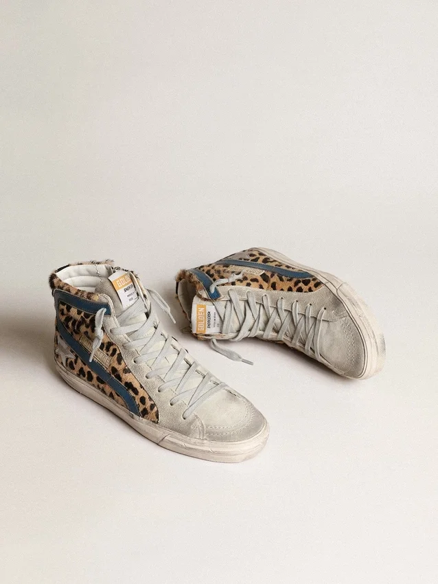 Slide da donna in pelle di pony con stampa leopardata e stella in pelle argentata