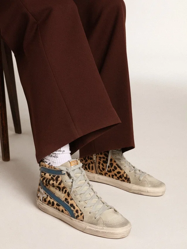 Slide da donna in pelle di pony con stampa leopardata e stella in pelle argentata