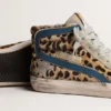 Slide da donna in pelle di pony con stampa leopardata e stella in pelle argentata