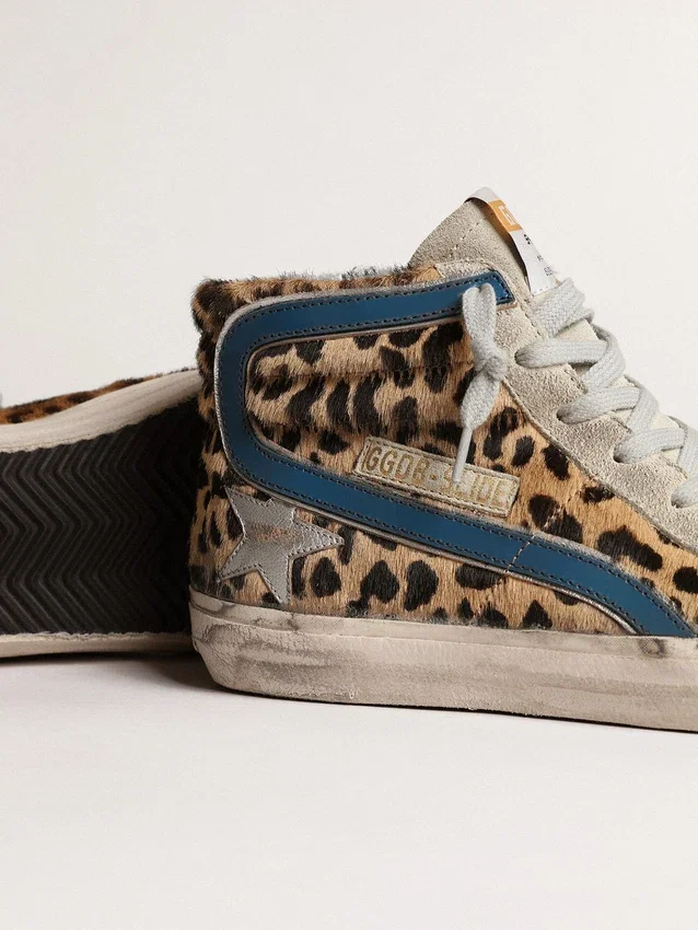 Slide da donna in pelle di pony con stampa leopardata e stella in pelle argentata