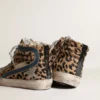 Slide da donna in pelle di pony con stampa leopardata e stella in pelle argentata