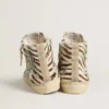Slide da donna in pelle di pony con stampa zebrata e inserto in pelle laminata verde