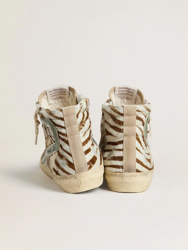 Slide da donna in pelle di pony con stampa zebrata e inserto in pelle laminata verde