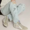 Slide da uomo in pelle con dettagli in pelle scamosciata