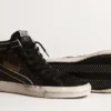 Slide in glitter marrone con stella in pelle nera e dettagli luccicanti