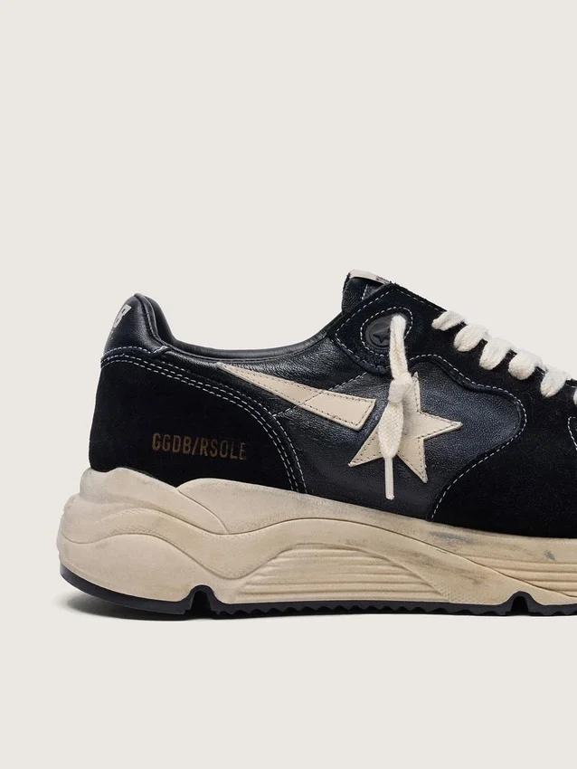 Sneaker da donna con Running Sole in nappa e pelle scamosciata nere