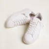 Sneakers Purestar da donna con linguetta sul tallone argentata glitterata