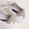 Sneakers Purestar da donna con linguetta sul tallone argentata glitterata