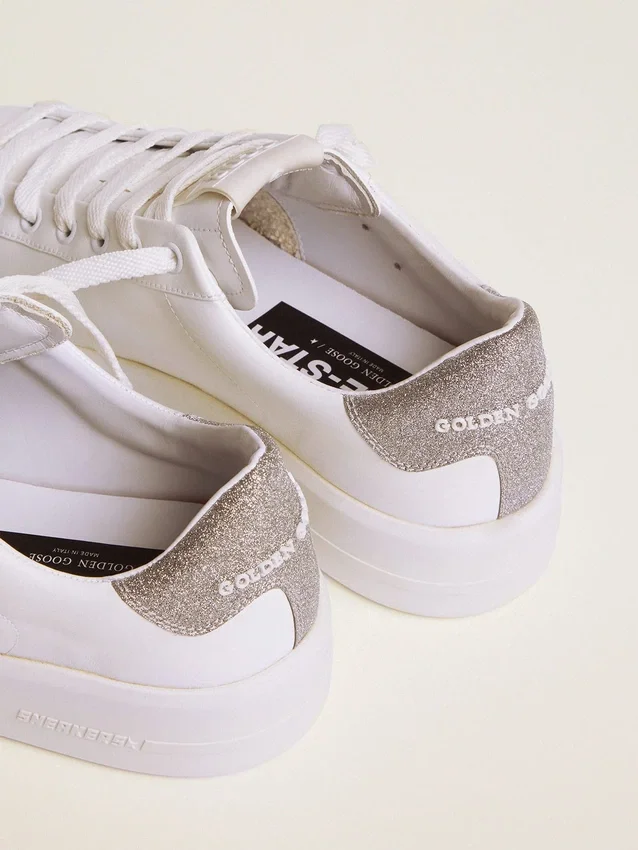 Sneakers Purestar da donna con linguetta sul tallone argentata glitterata