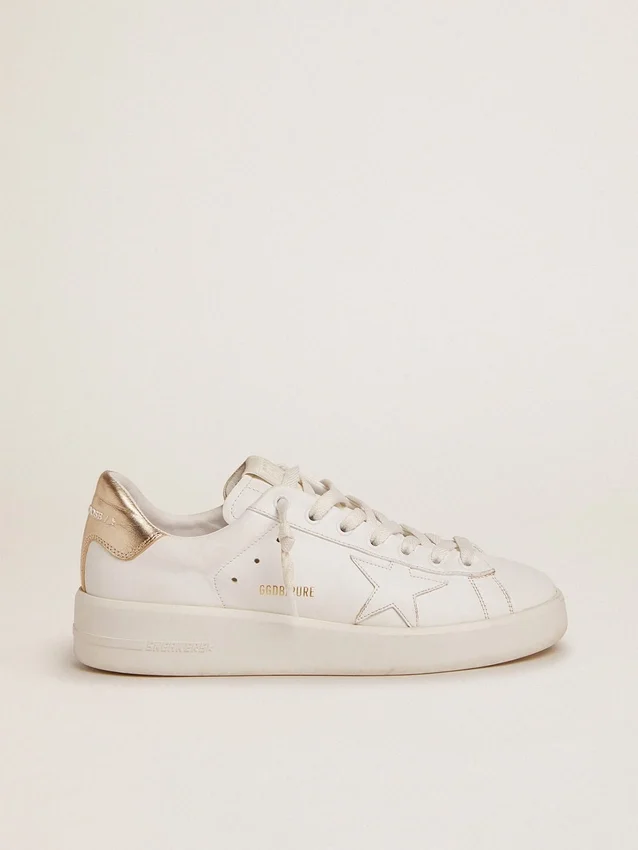 Sneakers Purestar da donna con linguetta sul tallone color oro