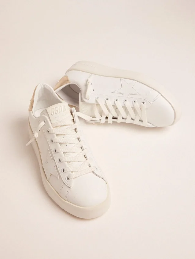 Sneakers Purestar da donna con linguetta sul tallone color oro