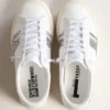 Sneakers sostenibili Yatay modello 1B con tomaia bianca a base biologica e glitter riciclati argentati Y