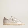 Sneakers Super-Star in pelle grigio-bianca con effetto glitter e stella in pelle