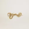 Spilla a forma di serpente color oro antico