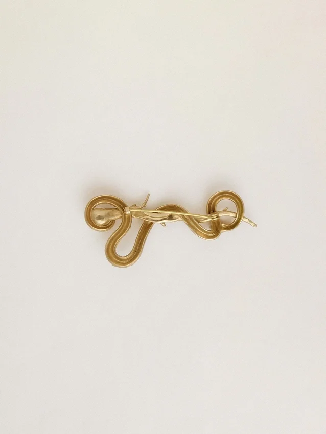 Spilla a forma di serpente color oro antico