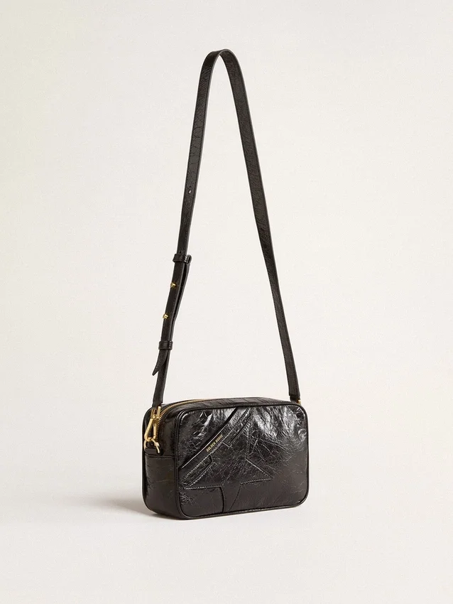 Star Bag in pelle nera lucida con stella tono su tono