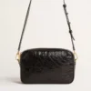 Star Bag in pelle nera lucida con stella tono su tono