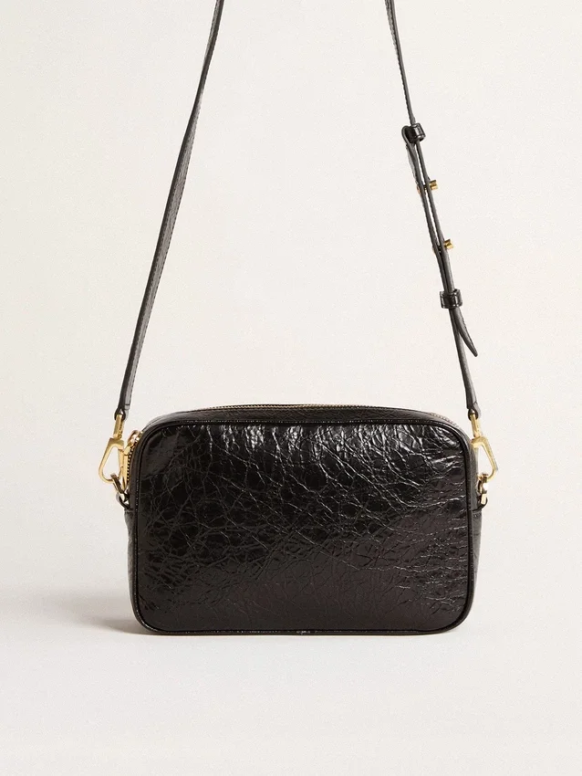 Star Bag in pelle nera lucida con stella tono su tono