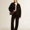 Star Bag in pelle nera lucida con stella tono su tono