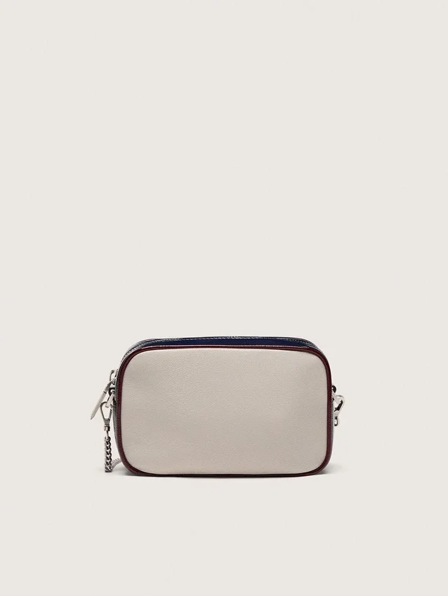 Star Bag Mini in pelle bianco burro con stella nera e dettagli bordeaux e blu scuro