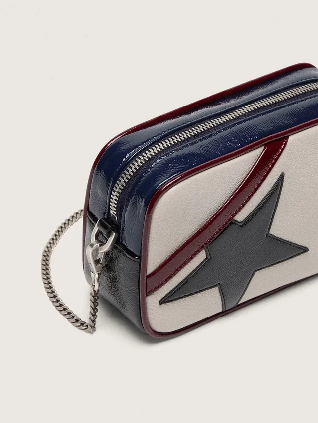 Star Bag Mini in pelle bianco burro con stella nera e dettagli bordeaux e blu scuro