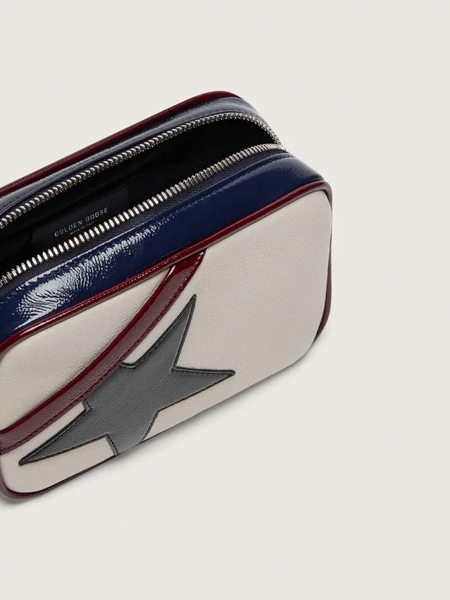 Star Bag Mini in pelle bianco burro con stella nera e dettagli bordeaux e blu scuro
