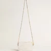 Star Bag Mini in pelle bianco burro con stella tono su tono