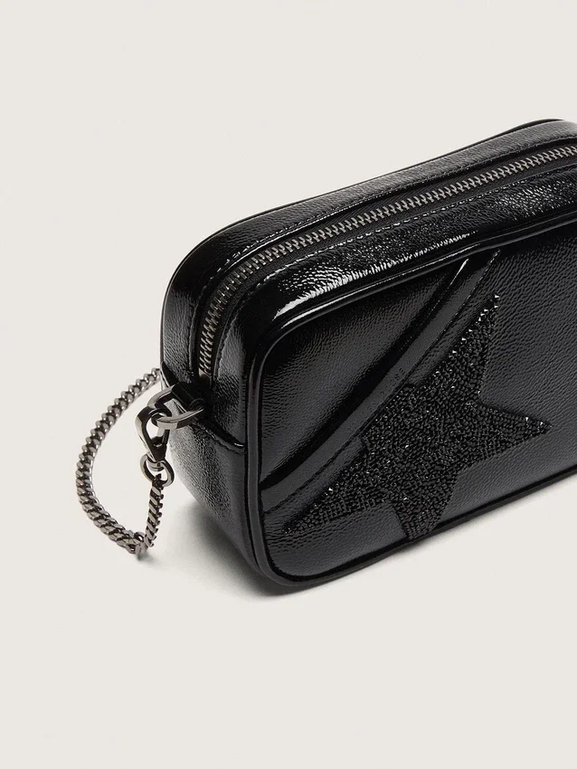 Star Bag Mini in pelle nera con stella in cristallo Swarovski