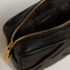 Star Bag Mini in pelle nera con stella tono su tono