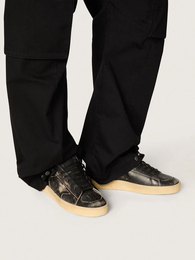Stardan da uomo in pelle nera con stella e linguetta sul tallone in pelle nera