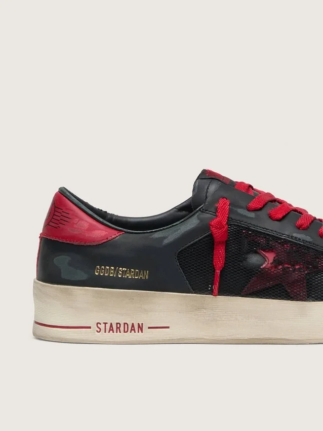 Stardan da uomo in pelle nera con stella rossa e inserti in rete nera e pelle rossa