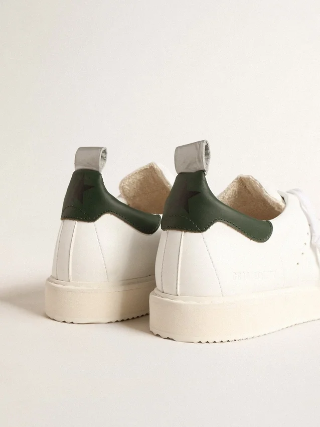 Starter a base biologica con linguetta sul tallone in pelle verde
