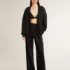 Stivali Young in pelle nera con ricami color sabbia