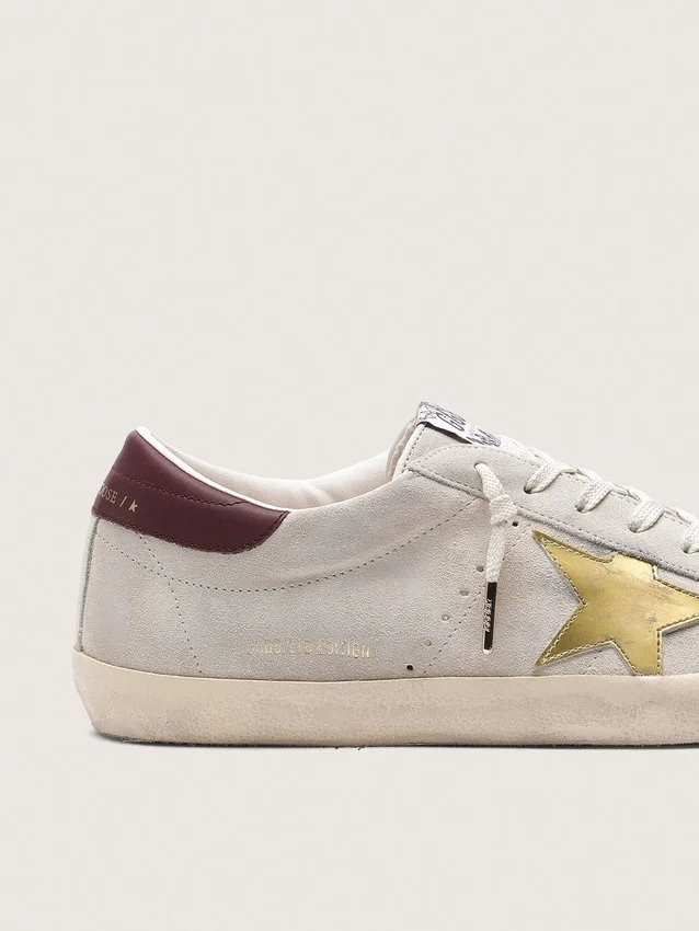 Super-Star CNY da uomo in pelle scamosciata avorio con stella in pelle metallizzata e linguetta sul tallone in pelle