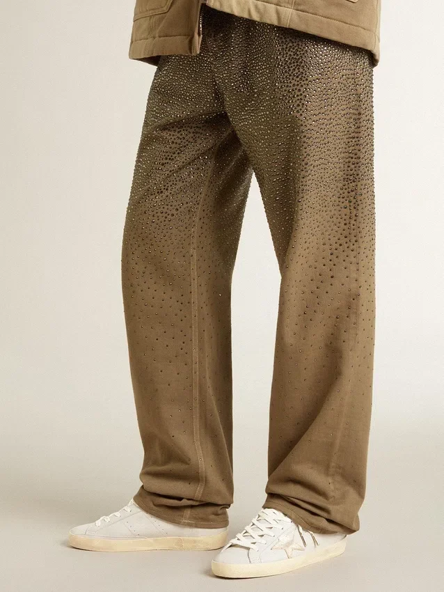 Super-Star con stella in pelle crackle e linguetta sul tallone in pelle con lamina metallica