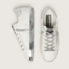 Super-Star da donna con bordo argentato scintillante e scritta con borchie metalliche