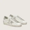 Super-Star da donna con linguetta argentata sul tallone e scritta con borchie metalliche