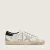 Super-Star da uomo con linguetta sul tallone nera e scritta con borchie metalliche