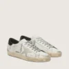 Super-Star da uomo con linguetta sul tallone nera e scritta con borchie metalliche
