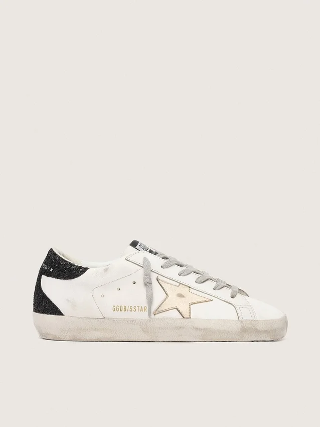 Super-Star da donna con stella dorata e linguetta sul tallone con glitter neri