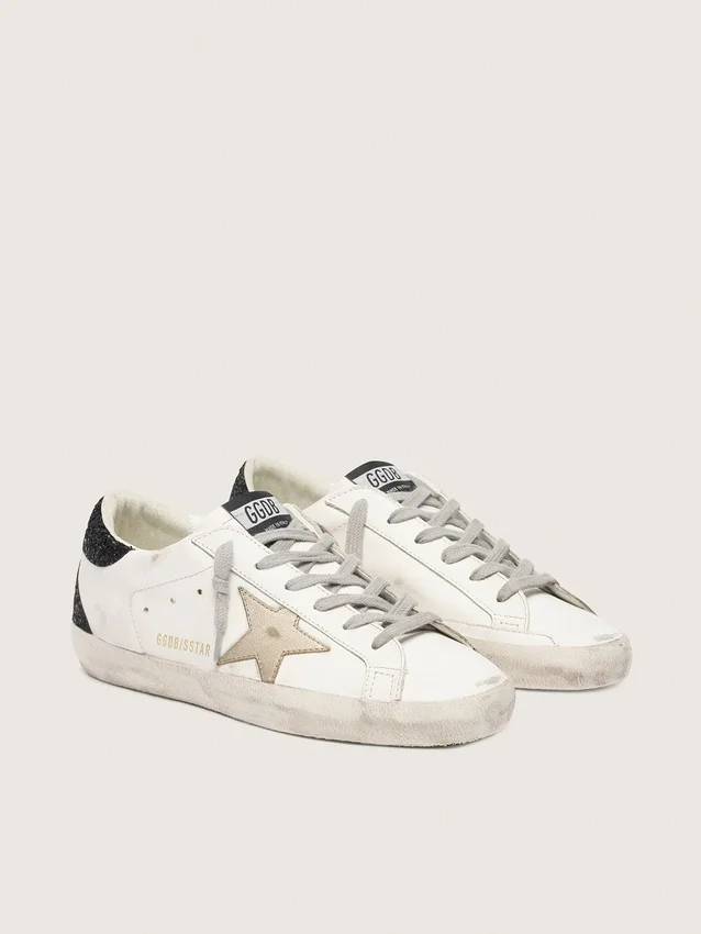 Super-Star da donna con stella dorata e linguetta sul tallone con glitter neri
