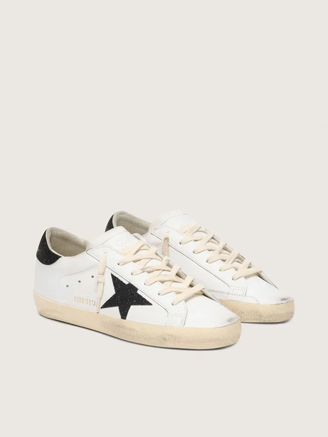 Super-Star da donna con stella in cristalli Swarovski neri e linguetta sul tallone