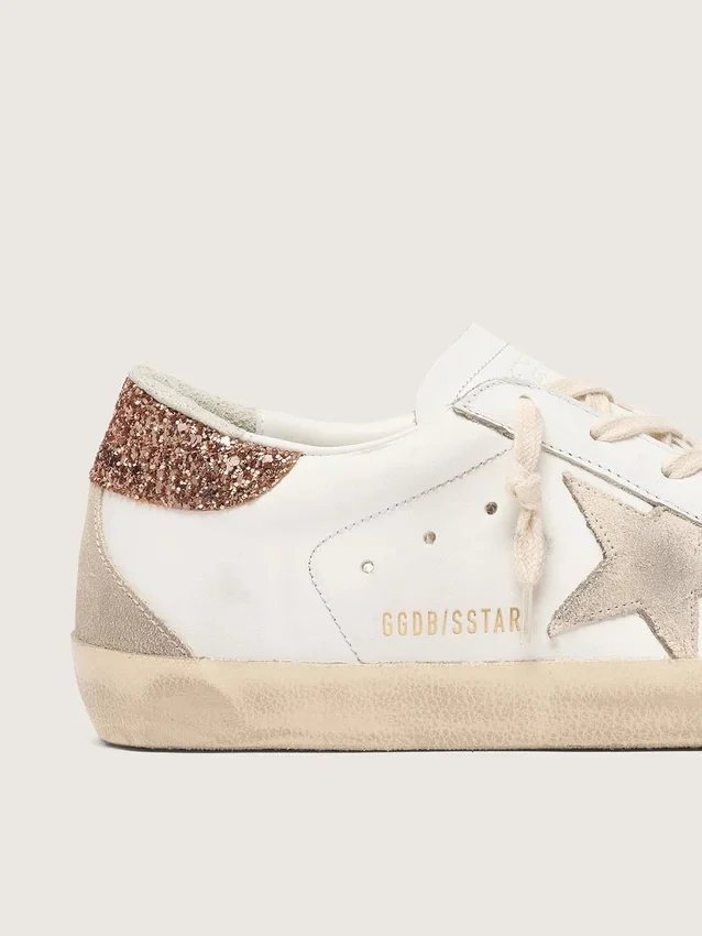 Super-Star da donna con stella in pelle scamosciata e linguetta sul tallone con glitter rosa pesca